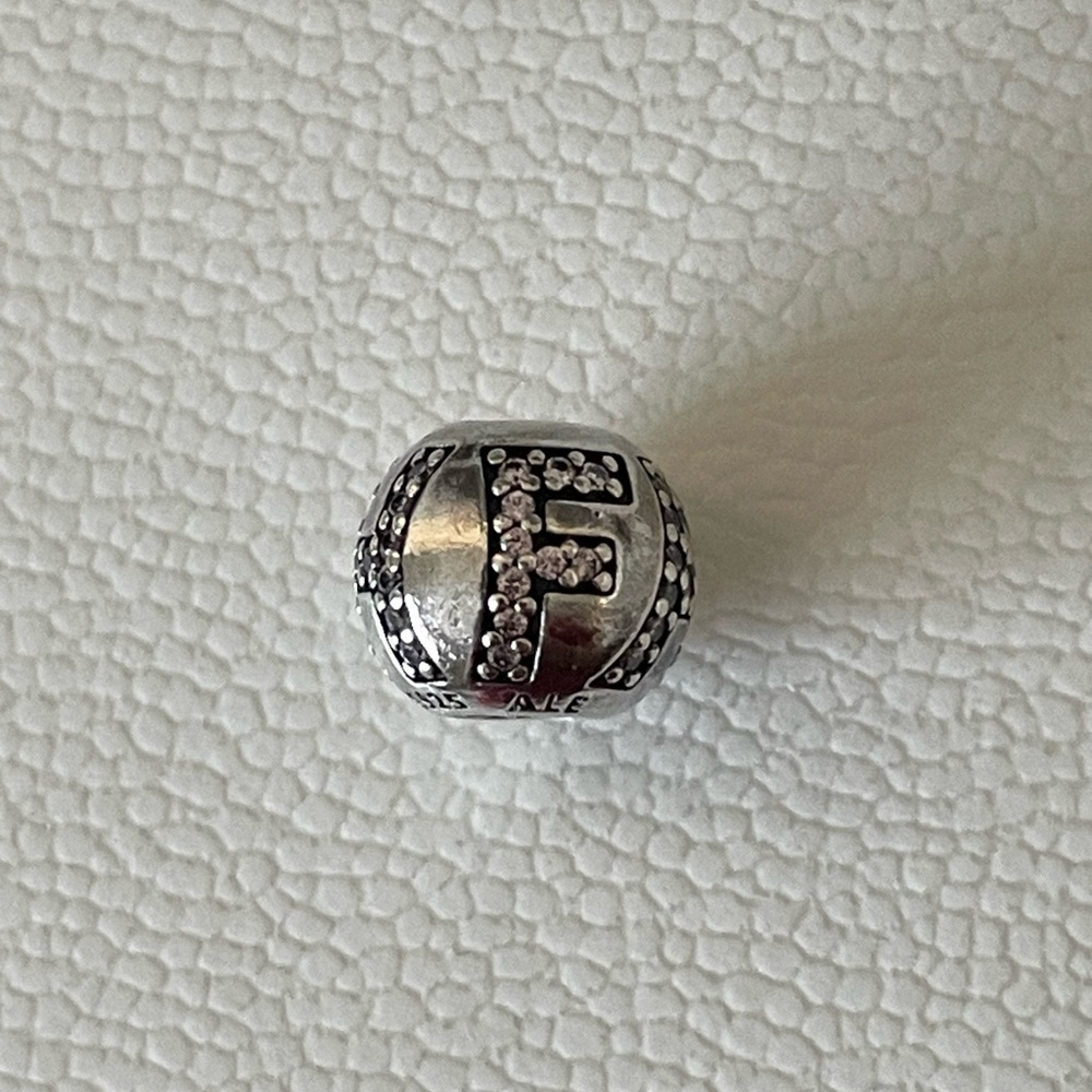 Authentic Pandora “Faith” Charm